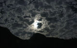 Full Moon and clouds over Half Dome