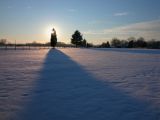 long shadows on snowfield