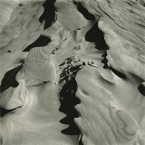 sand faces Oregon coast