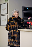 Mom in kitchen modeling fur coat 02