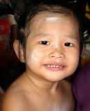 An inquisitive glance from an adorable little Thai girl
