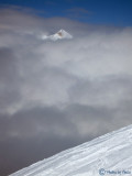 A quick glimpse of a peak between snowstorms