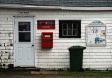 Small town post office in the rain