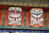 Figures over the door to the main chapel, Ani Sangkhung Nunnery