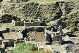 Ruins of a small village along the road