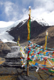 Prayer flags and stupa at Karo-la Pass