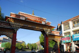 Tibetan style gate to the touristy Buxing Jie leading to Tashilhunpo Monastery