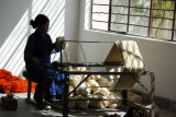 The spinning room where the raw wool is spun into yarn