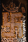 Swastika made of coins, Tashilhunpo