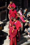 Monks leaving the assembly hall