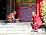 Monks chatting at the entrance to the Tomb of the 5-9 Panchen Lamas