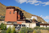 Looking east across the main row of buildings of Tashilhunpo along the north edge of the monastery