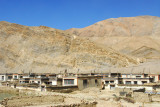 Passing through another Tibetan village along the Friendship Highway