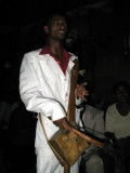 Azmari (Ethiopian minstrel) playing a masenqo