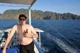 Enjoying a cold San Miguel beer after the first day of diving