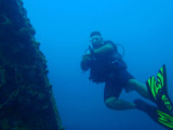 Dive guide alongside the Kogyo Maru