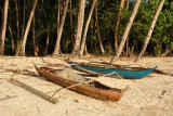 Outrigger canoes along Corong-Corong Beach