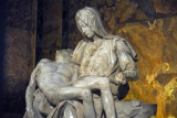 Ever since a nut (Australian) attacked the Pietà in 1972, it's been kept behind glass