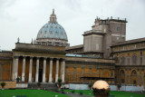 Courtyard of the Vatican Museum with the dome of St. Peter's and the sphere
