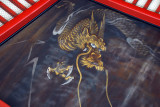 Dragon looking down from the ceiling of the ablution fountain pavilion, Sensō-ji Temple