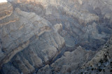 Sheer drop off the edge looking down into Wadi Nakhr