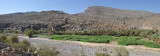 Panorama with Wadi Ghul, the ruins of the ancient village of Ghul and Jabal Shams