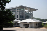The South Korean House of Freedom behind one of the 7 meeting rooms straddling the border