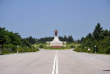 Kim Il Sung monument at the top of the grand boulevard of Kaesong