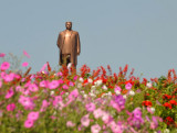 Flowers with the statue of the Great Leader Kim Il Sung, Kaesong