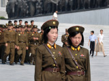 North Koreans in uniform at Mansu Hill Grand Monument