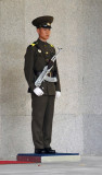 North Korean guard with a silver plated AK-47