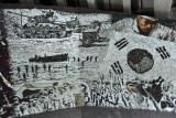 Mosaic beneath the Statue of Brothers expressing the spirit of the Korean people to overcome the national tragedy