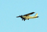 Cessna 206 (A2-AEI) flying low towards Kasane Airport