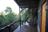 Patio overlooking a hippo channel, Guma Lagoon Camp