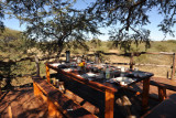 Picnic table on the deck of the treehouse