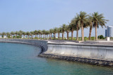 Palm lined sea wall of the Doha Corniche near the Museum of Islamic Art