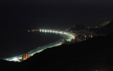 The arc of Copacabana at night from the top of Sugarloaf