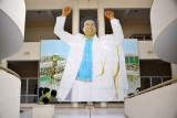 Colossal Gadhafi greets visitors to the Leptis Magna Musuem