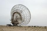 A destroyed Kuwaiti satellite antennta left over from the Iraqi invasion in 1990