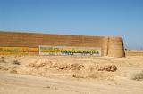 Caravanserai covered with advertising just outside Abarqu