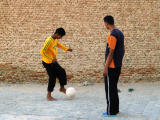 Boys playing soccer, Nefta