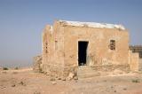 Remains of a house at the top of the ridge