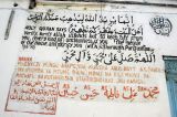 Trilingual Koran verses (33:33) Arabic-English-Swahili