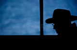 Silhouette of man on ferry
