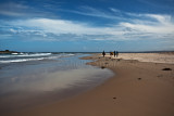 Four surfers at Manyana