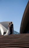Bride and groom on Sydney Opera House steps