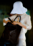 Lady with hat and bag