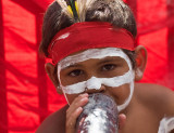 Aboriginal child with didgeridoo