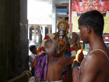 Peyazhwar receiving srisatakopa mariyadai from kesavan after purappadu.jpg