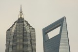 Contrasting styles: tops of the Jin Mao Tower (left) and World Financial Centre, Shanghai